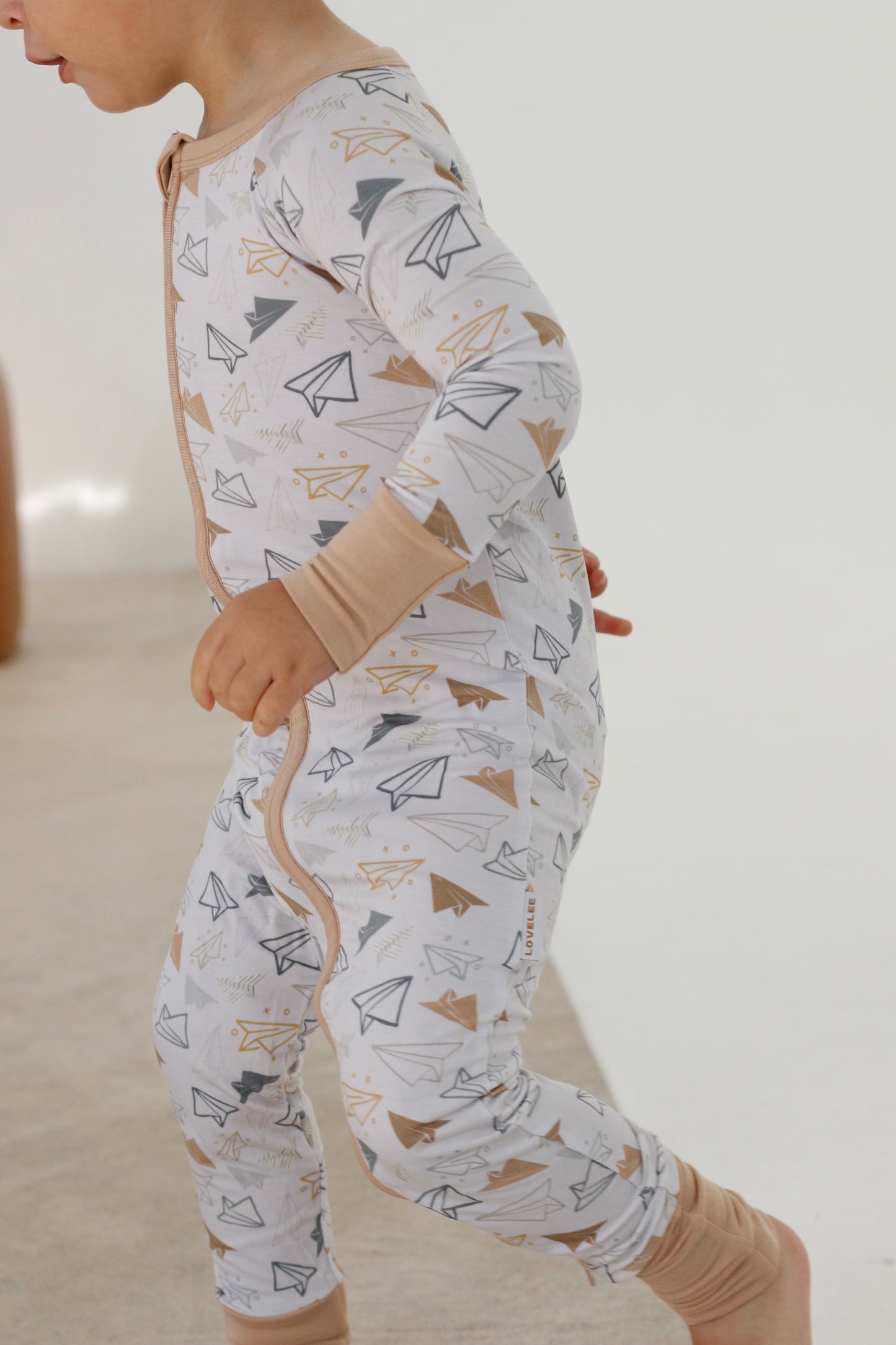 Paper Airplane Zip Romper